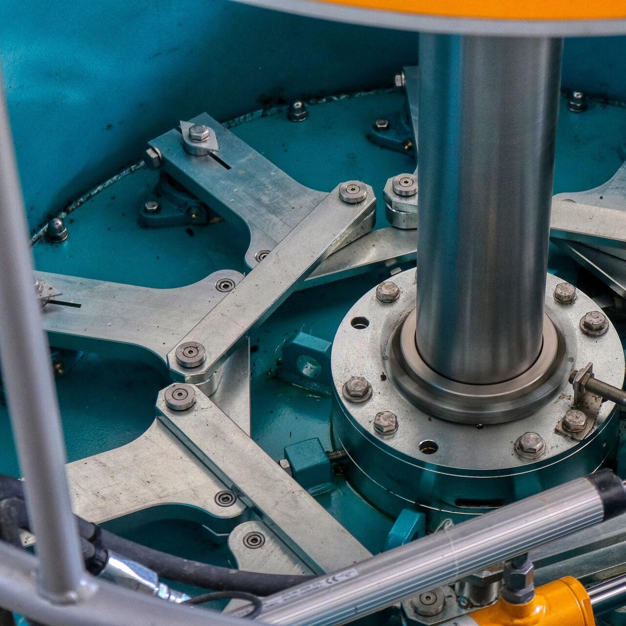 Close-up of industrial turbine machinery, representing energy sector advisory